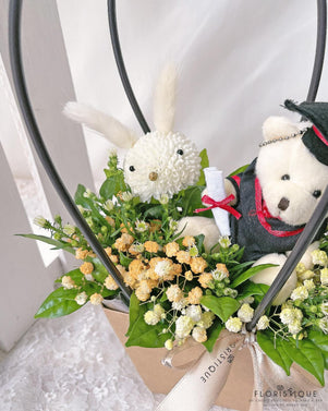 Callie Flower Basket - Mum, Baby's Breath, And Graduation Bear Arranged By Florist In Singapore, Floristique