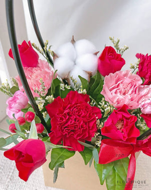 Avery Flower Basket - Cotton Flower, Carnations, Roses, And Carnation Spray Arranged By Florist In Singapore, Floristique