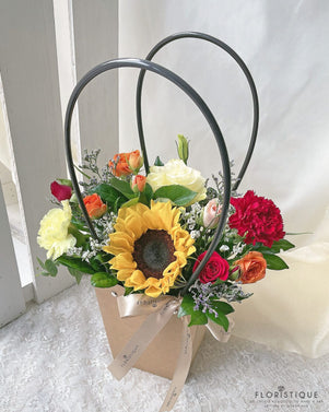 Clarabelle Flower Basket - Sunflower, Roses, Spray roses, Eustoma, And Carnations Comes With Flower Delivery Singapore Service