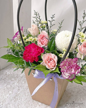 Charlotte Flower Basket - Carnations, Spray Carnations, Mum, And Spray Roses Arranged By Florist In Singapore, Floristique