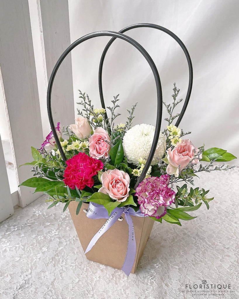 Charlotte Flower Basket - Carnations, Spray Carnations, Mum, And Spray Roses Arranged By Florist In Singapore, Floristique